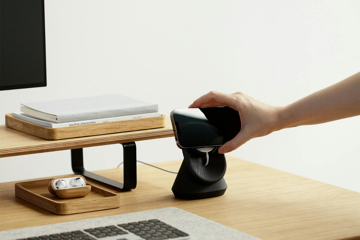 Hidden charging station built-in inside a drawer with USB ports and wireless charging pad for clutter-free device organization